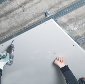 Home 21 Home worker with drill screwdriver twists screw into drywall scaled 492dad3d https://scgvlxd.com/ vlxd scg